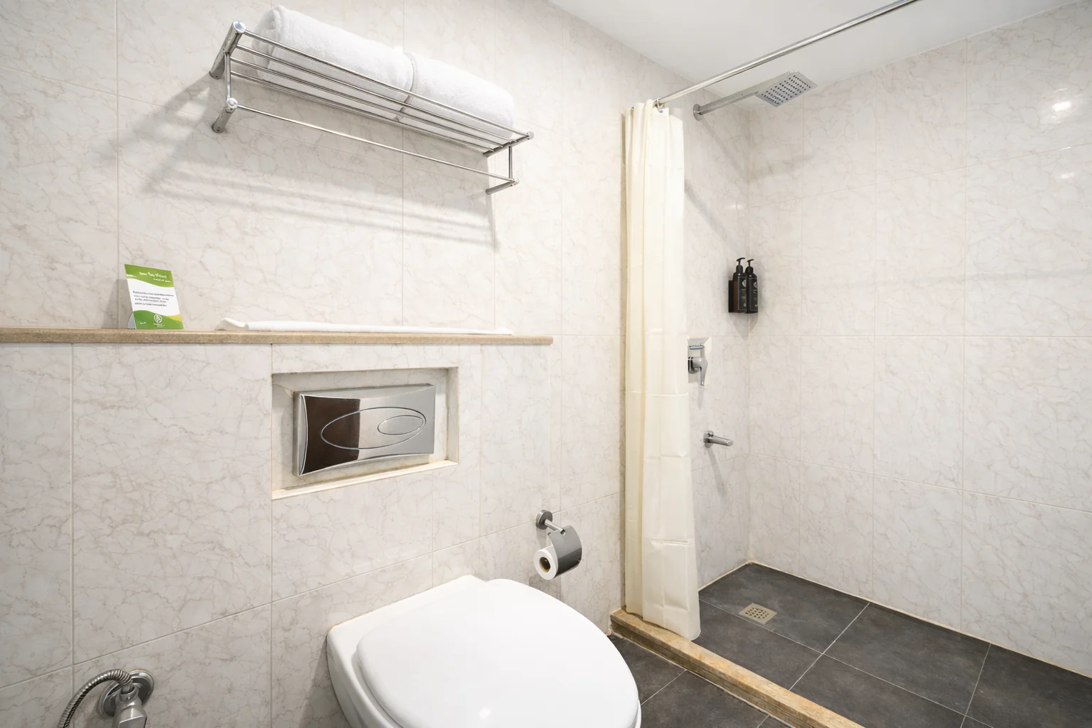 Modern bathroom in premium room at Amber Palace Hotel Gurgaon